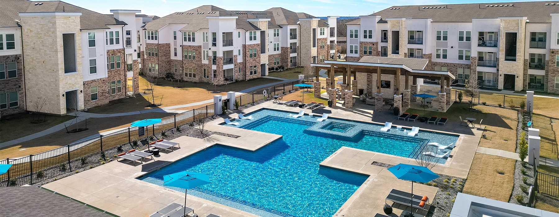 a swimming pool surrounded by buildings